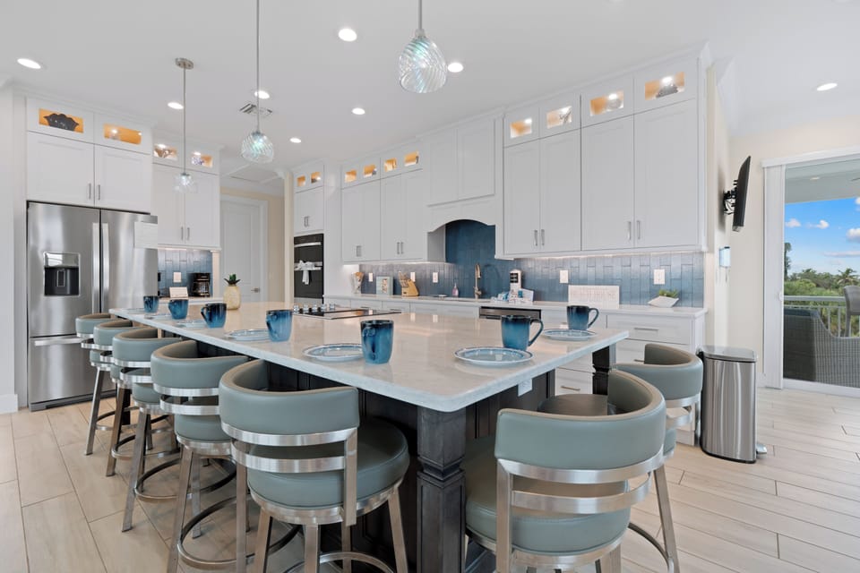 Stunning kitchen with bar stool seating.