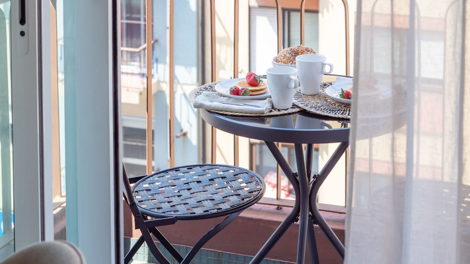 Small balcony ideal for a relaxed breakfast or evening drinks. #MorningCoffee #BalconyVibes