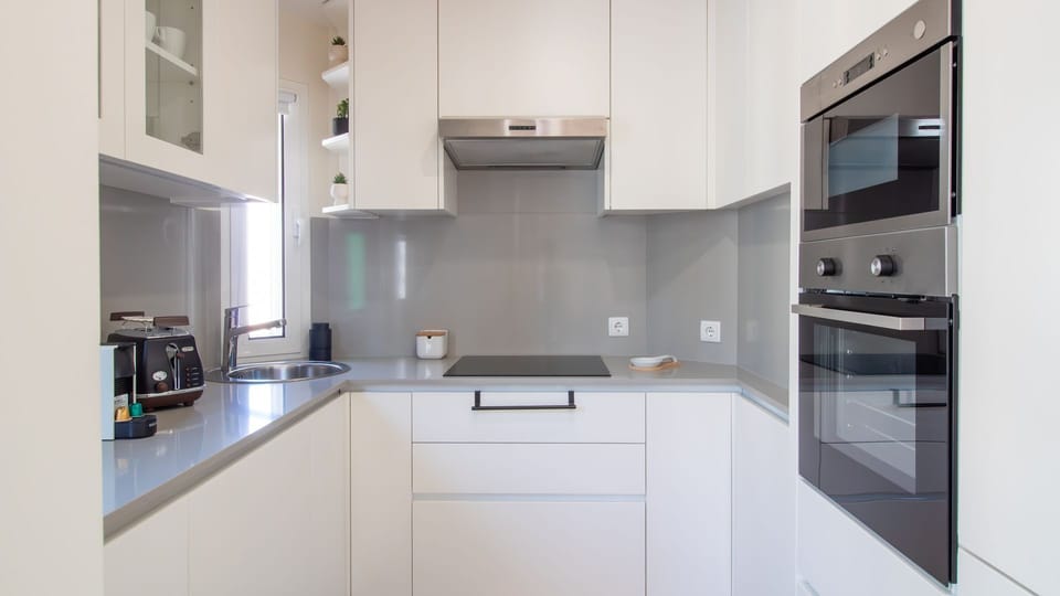 Fully equipped kitchenette with modern appliances for your convenience. #FullyEquipped #SelfCatering