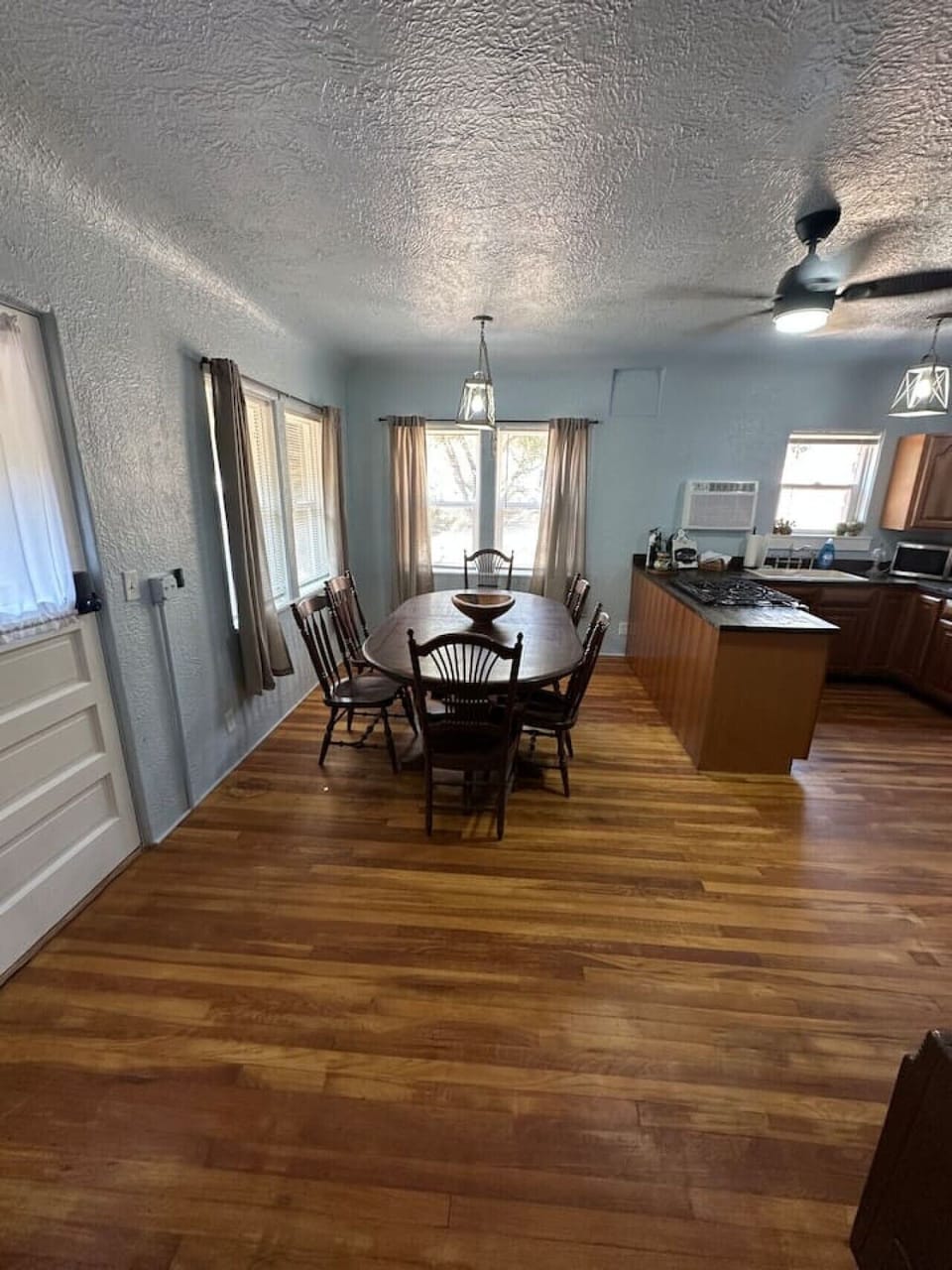 Open concept floor plan view of kitchen and dining areas.