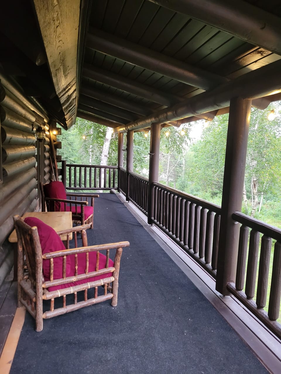 Covered porch facing the river.