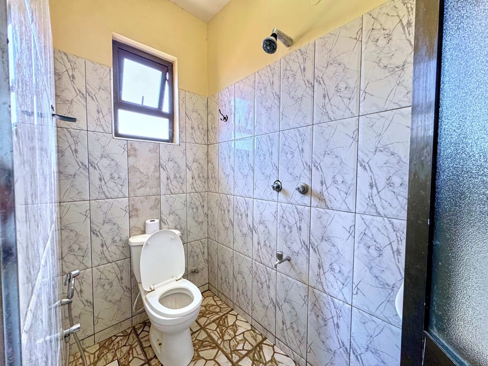 Standard Room | Bathroom | Shower, free toiletries, towels, soap