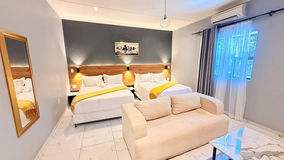 Family Double or Twin Room, 2 Queen Beds | Desk, laptop workspace, iron/ironing board, free WiFi