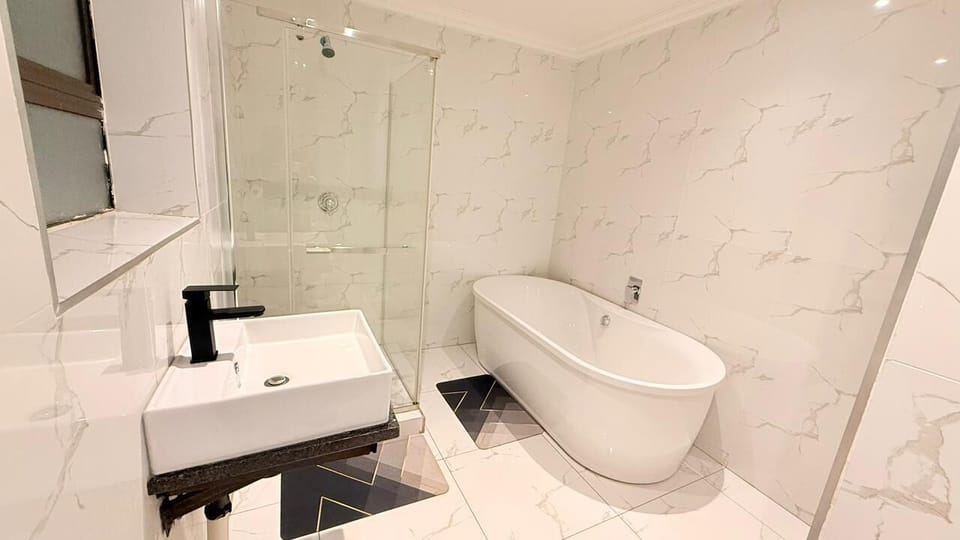 Family Double or Twin Room, 2 Queen Beds | Bathroom | Shower, free toiletries, towels, soap