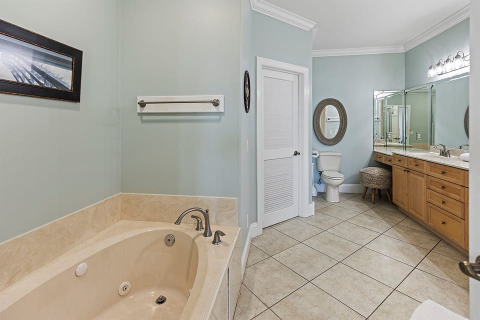 Unwind in your spa-like bathroom with a luxurious jetted tub and spacious vanity, perfect for relaxing after your adventures.