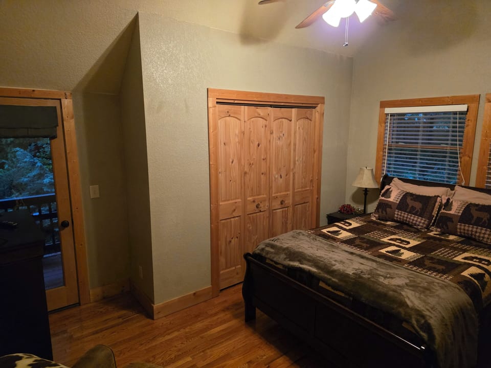 Queen room features an ultra-comfortable bed and a private front-facing balcony.