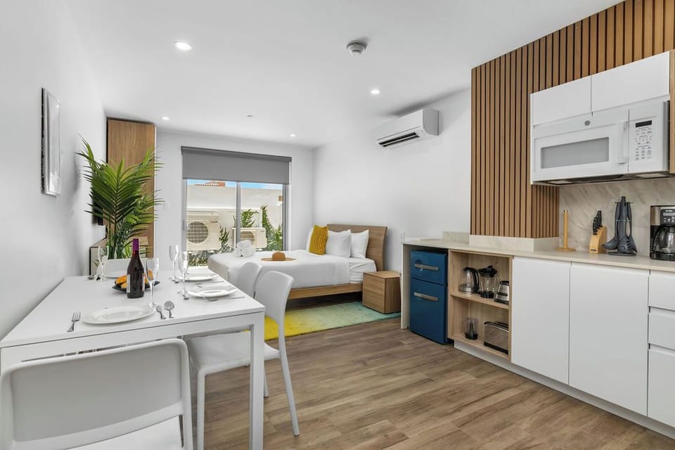 Share a meal, share a story. Our open-concept dining area is perfect for gathering together, whether you're cooking in the kitchen or relaxing in bed. It's the ideal space for making memories with friends and family.