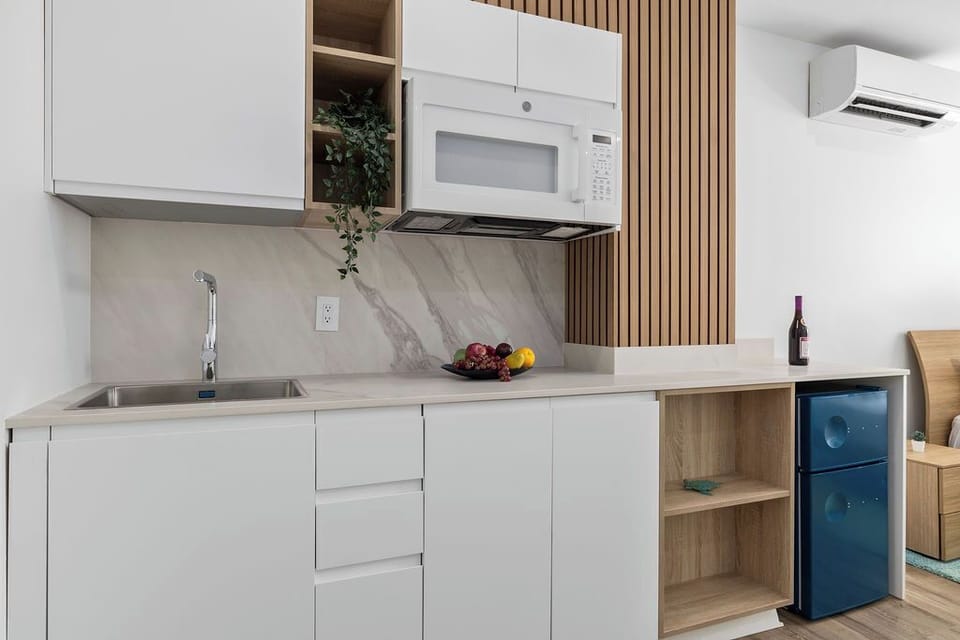 Whip up quick bites or light meals in our convenient kitchenette — fully equipped for your comfort and perfect for short stays.