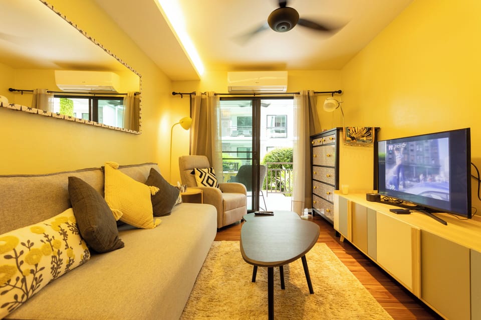 Basic Apartment, Balcony | Living area | Flat-screen TV