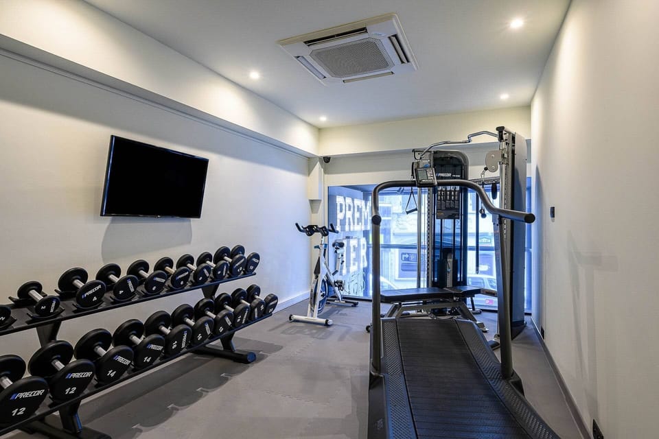 Build strength anytime with free weights and cardio machines.