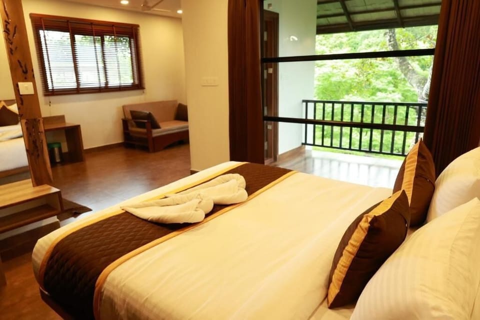 Suite, Balcony, Garden View | Blackout drapes, iron/ironing board, free WiFi