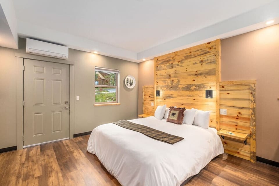 The door next to the bed leads to an ADA accessible parking spot