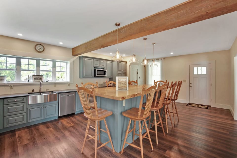 Family gathering space at the high top island table