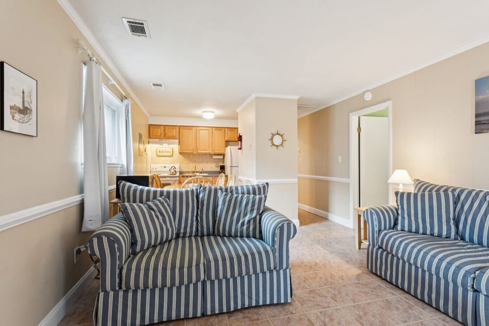 The living room connects to the kitchen and dining area so everyone can stay connected.