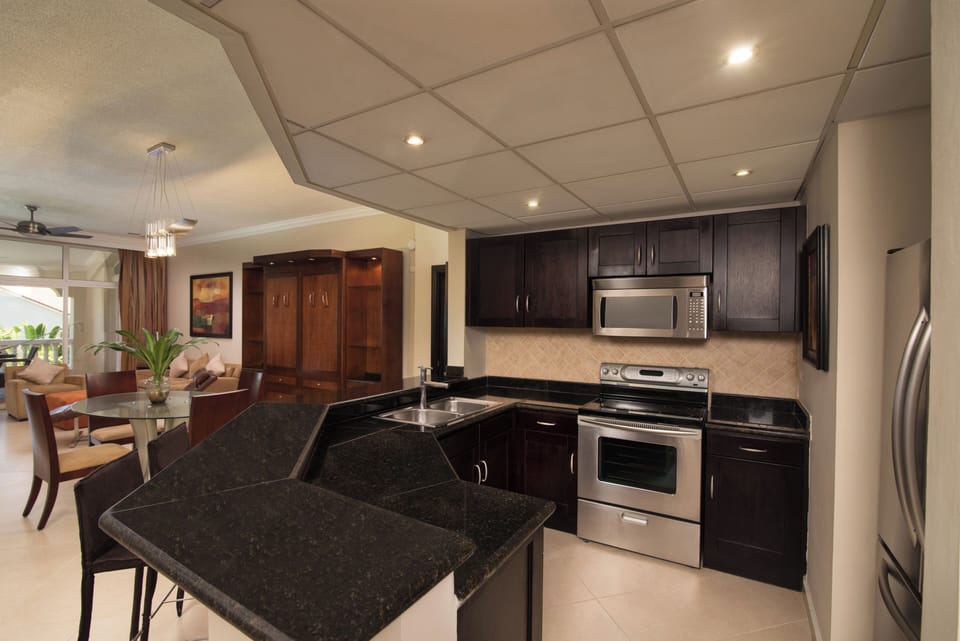 Presidential Suite, 2 Bedrooms, Balcony, Courtyard View | Private kitchen | Coffee/tea maker, highchair