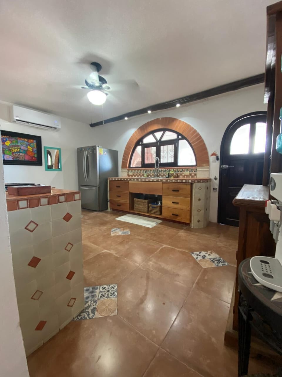 Kitchen: large fridge & freezer and lots of space for people to cook together.