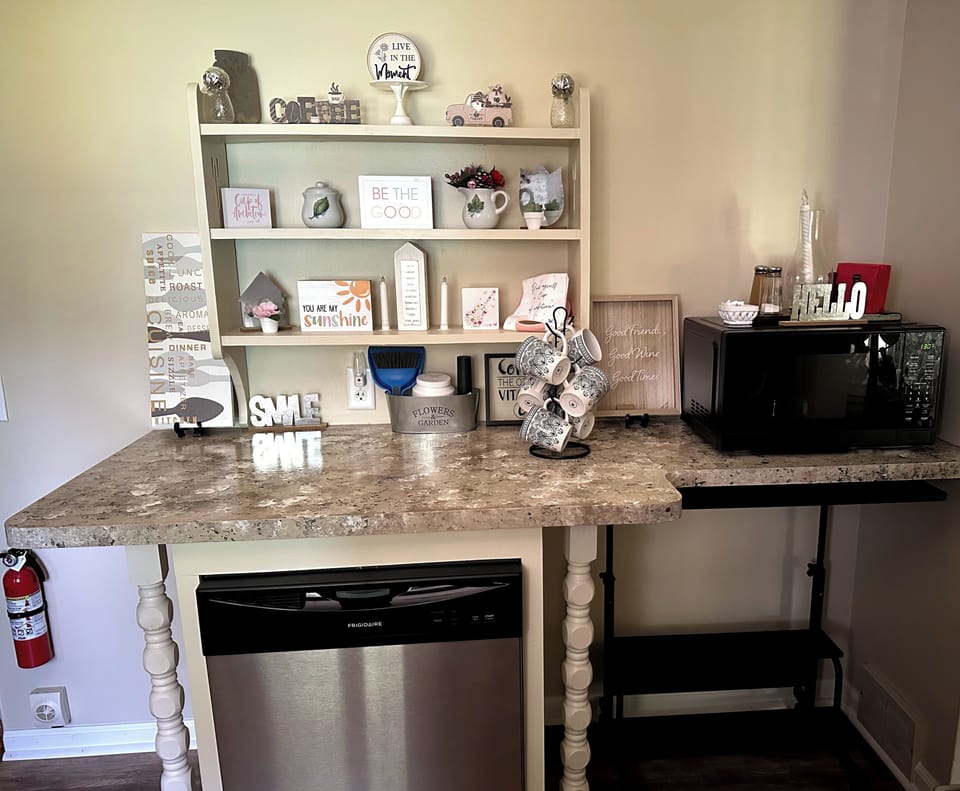 Kitchen micro., dishwasher, adj. port. computer desk and lots of counterspace. 