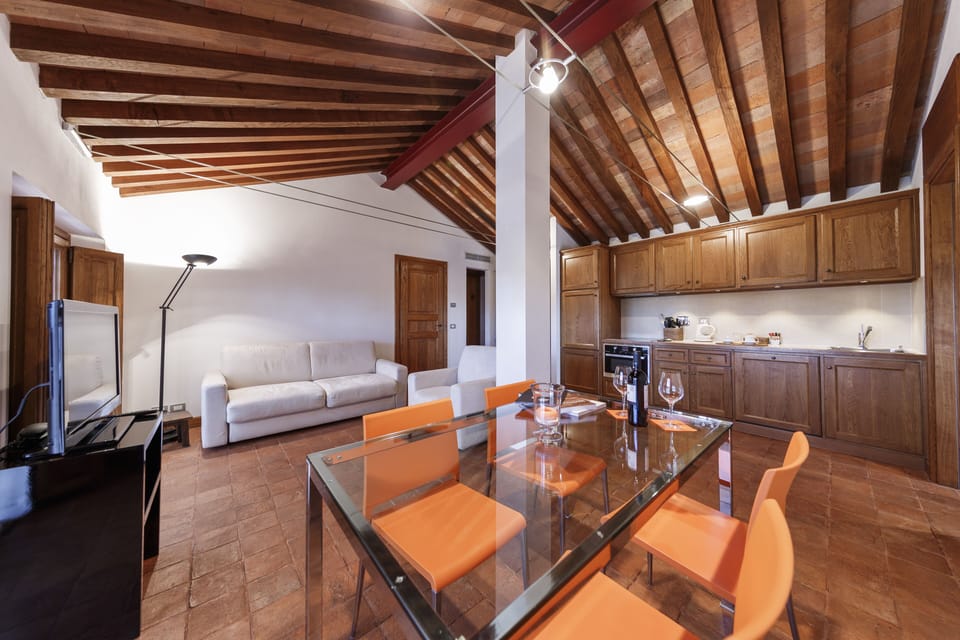 Deluxe Apartment | Living area | Flat-screen TV