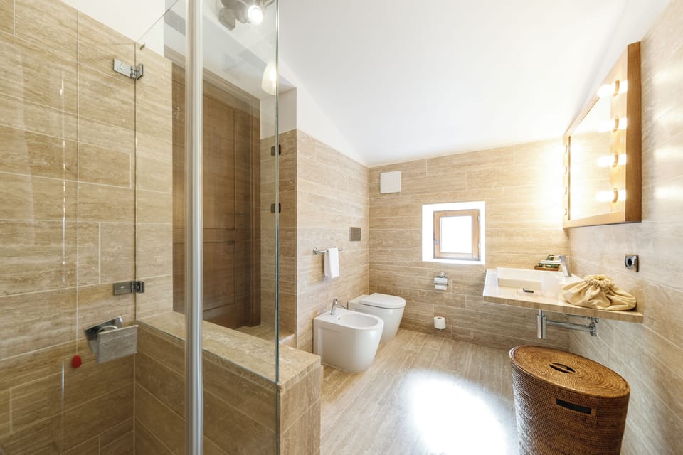 Shower, free toiletries, hair dryer, slippers