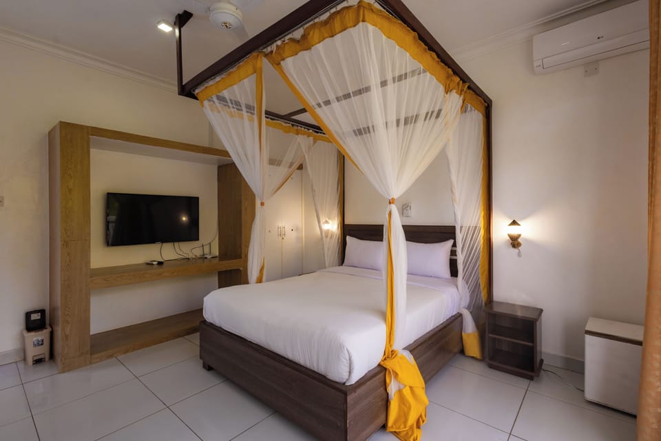 Deluxe Double or Twin Room, Balcony, Pool View | In-room safe, desk, laptop workspace, blackout drapes
