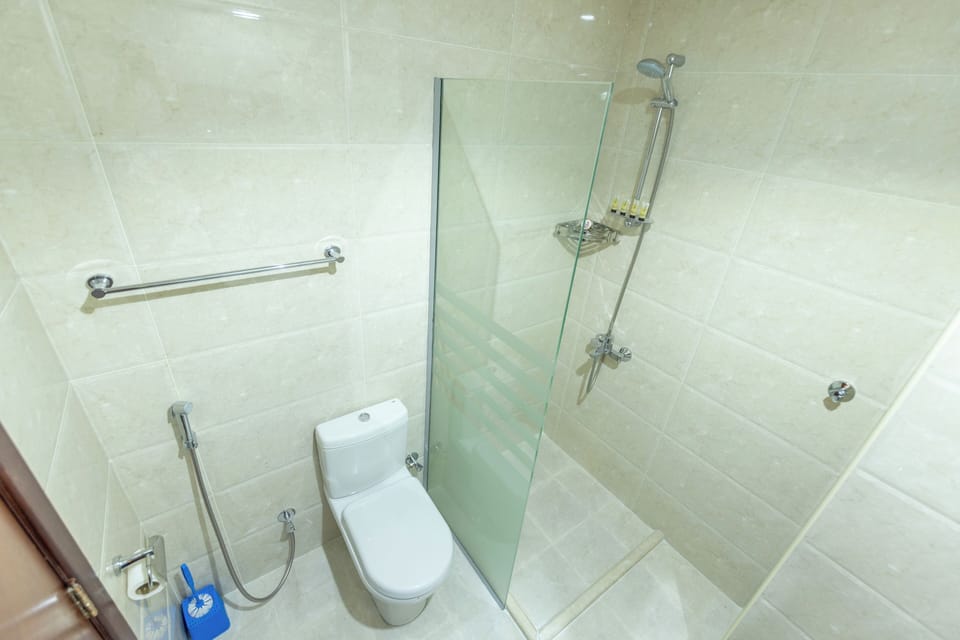 Shower, free toiletries, hair dryer, slippers