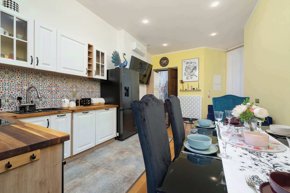 A cosy dining area connected to the kitchen, where shared meals take on a special charm.