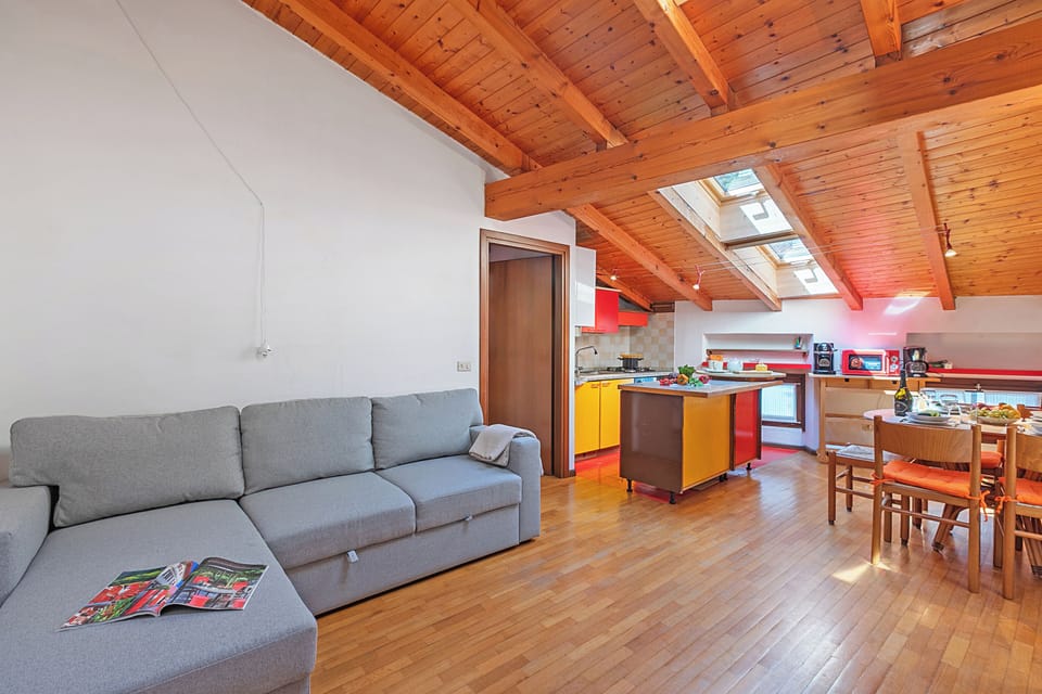 Family Apartment, Multiple Bedrooms (Skylight) | Living area | 21-inch flat-screen TV with cable channels
