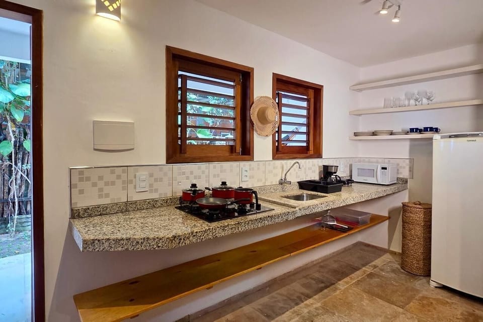 Microwave, stovetop, cookware/dishes/utensils