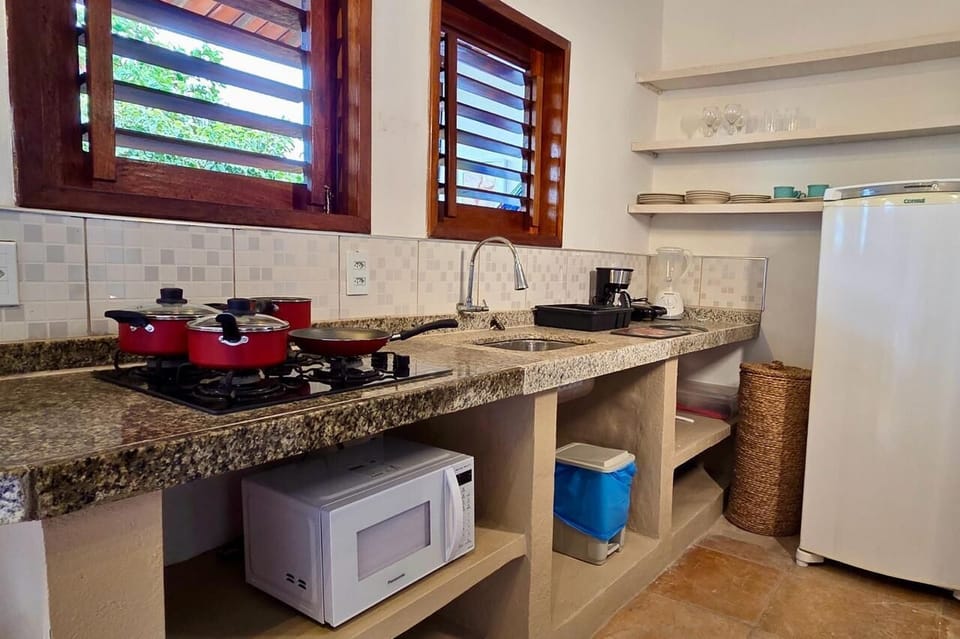 Microwave, stovetop, cookware/dishes/utensils