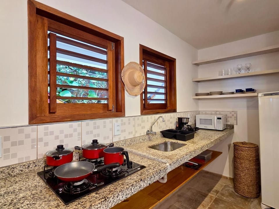 Microwave, stovetop, cookware/dishes/utensils