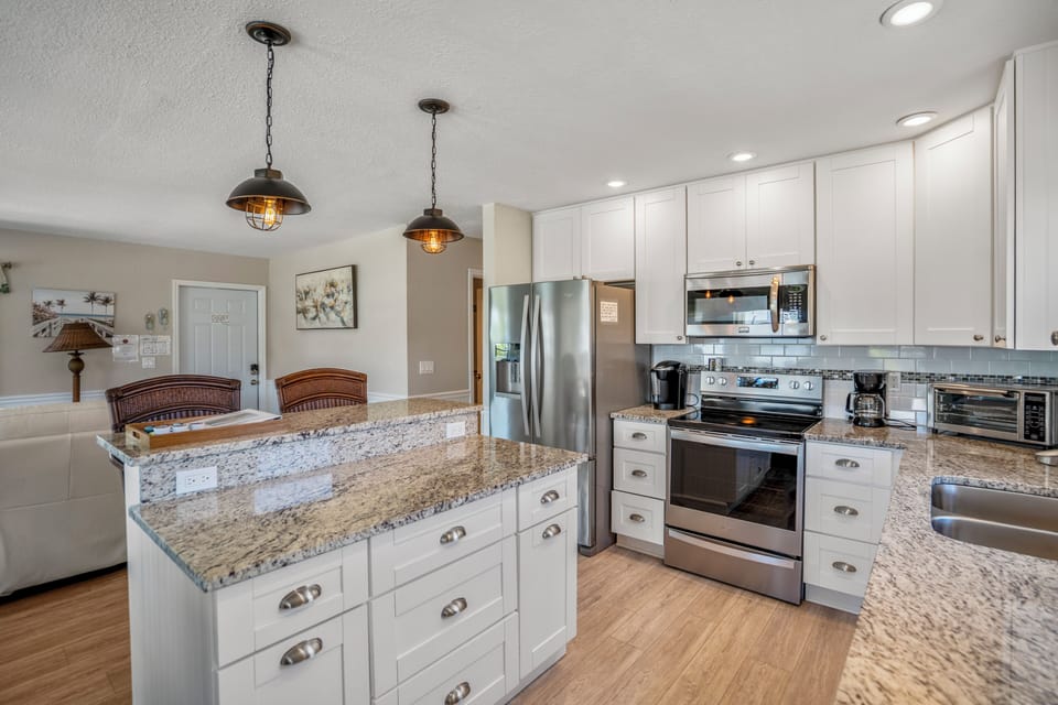 Cook comfortably in the fully stocked full kitchen with all the essentials - from pots/pans, baking sheets, cutting boards, blender, and more! 