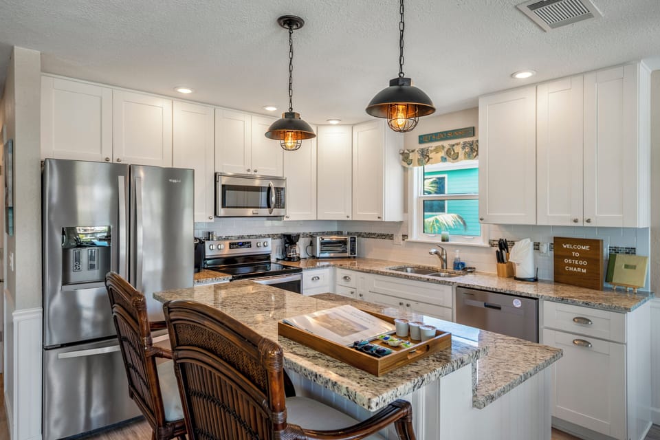 Cook comfortably in the fully stocked full kitchen with all the essentials - from pots/pans, baking sheets, cutting boards, blender, and more! 