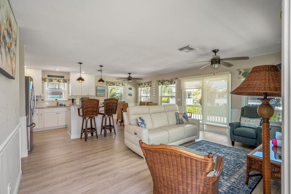 Comfortable living room area with a cozy couch and chairs—perfect for relaxing.