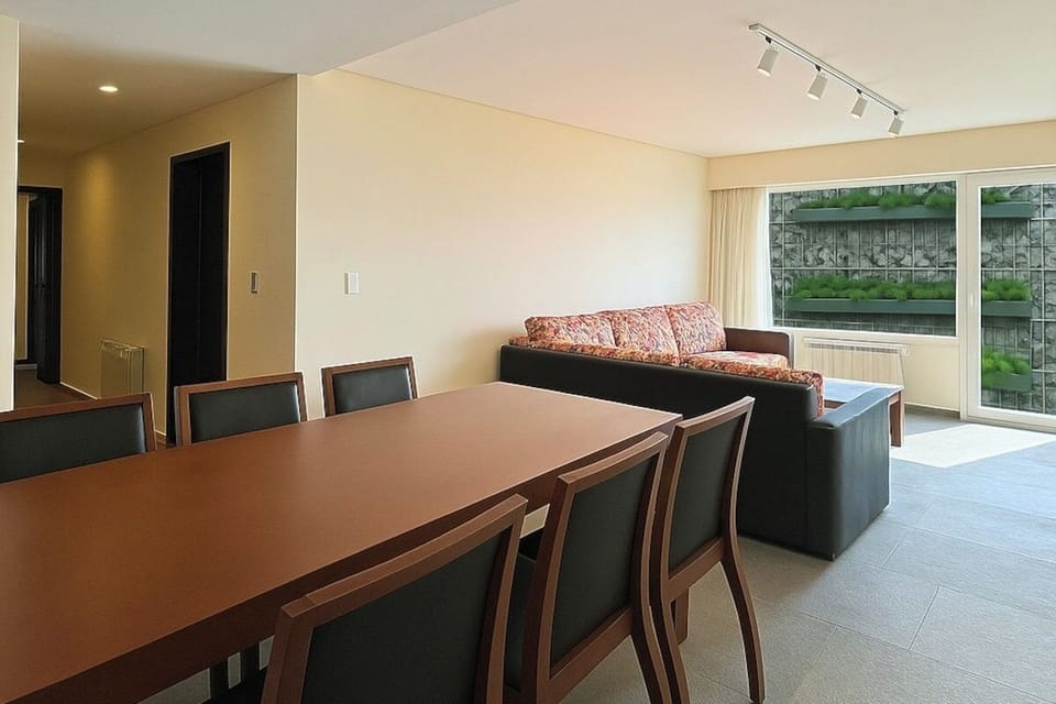 Gather for relaxed evenings in the bright living-dining space.