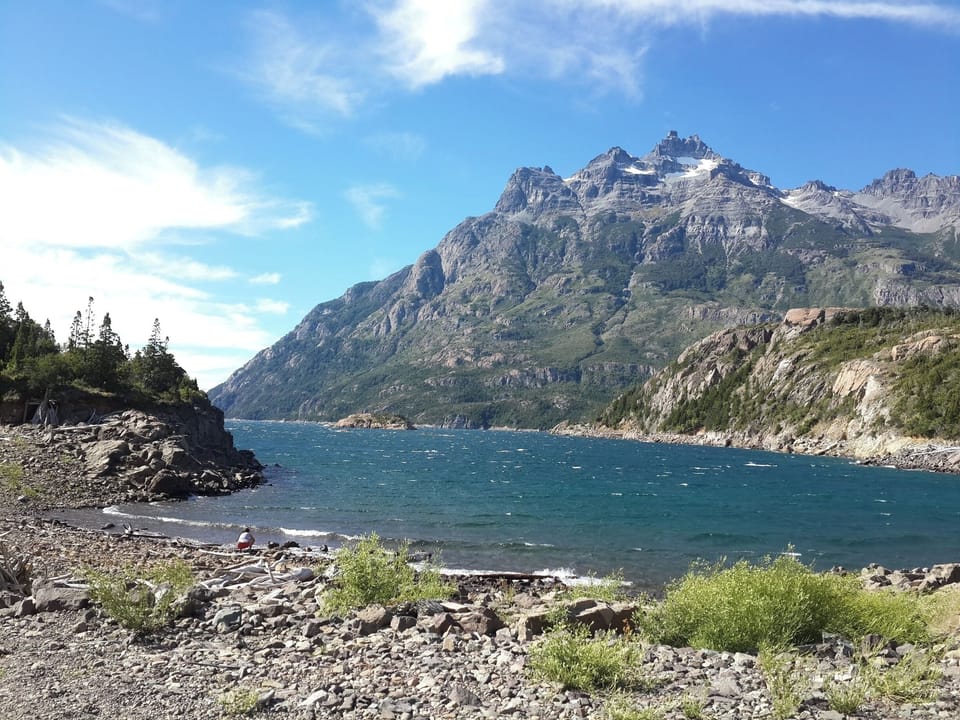 Explore rugged mountain shores and feel the fresh breeze.
