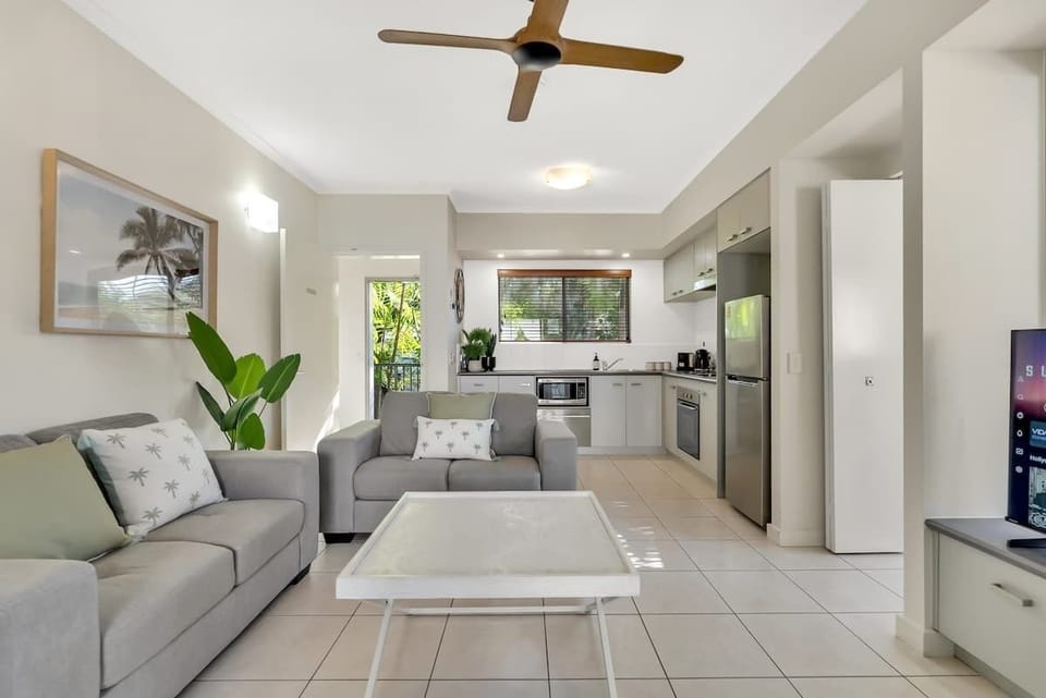 Step into the bright, breezy living area and unwind with a movie, all in the comfort of split system air conditioning and ceiling fan cooling.