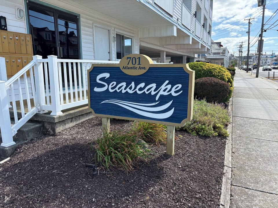 parking entrance to the right of this sign