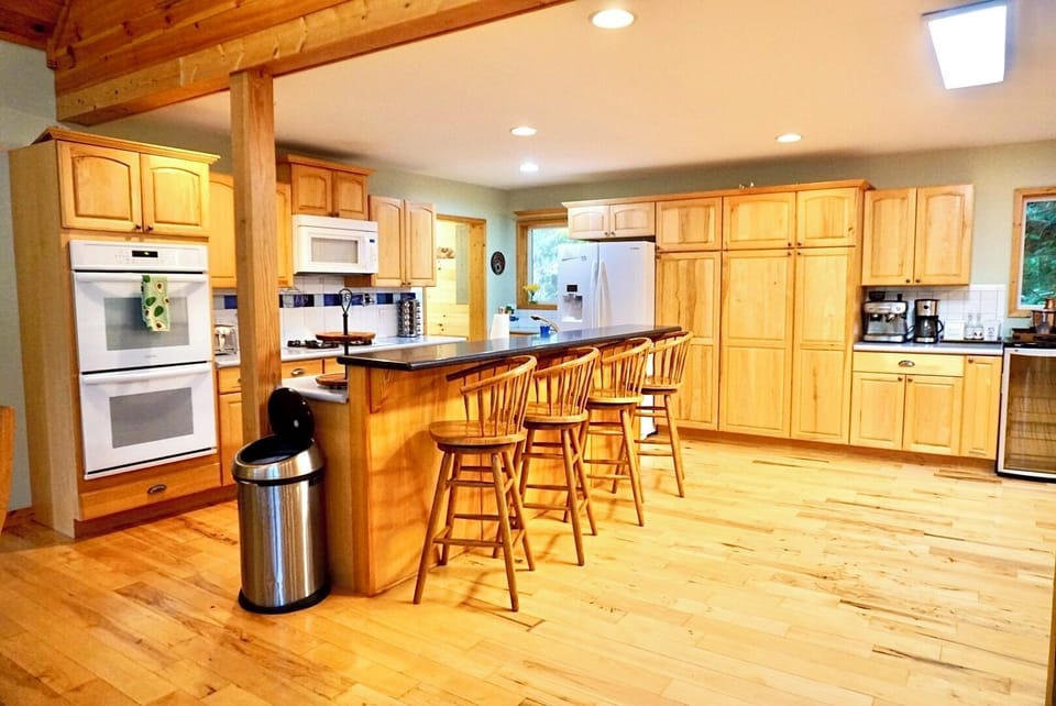 Kitchen: Modern amenities and ample seating make cooking a delightful adventure! Enjoy your stay!