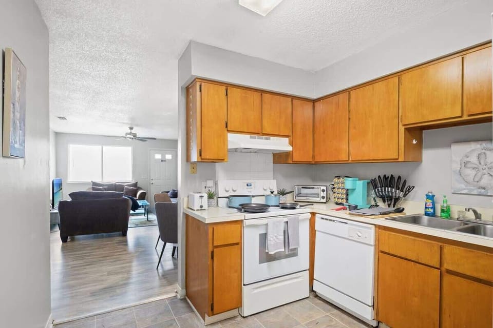 Kitchen offers full size refrigerator, stove/oven, microwave, toaster, toaster oven, Keurig coffee maker, and more.