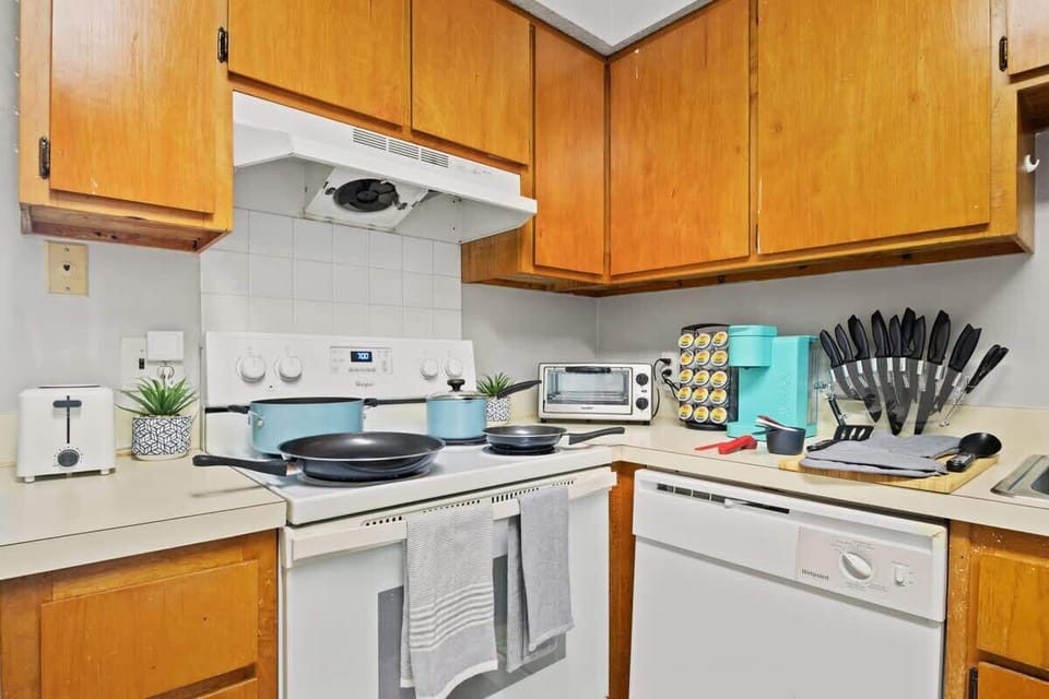 Kitchen offers full size refrigerator, stove/oven, microwave, toaster, toaster oven, Keurig coffee maker, and more.