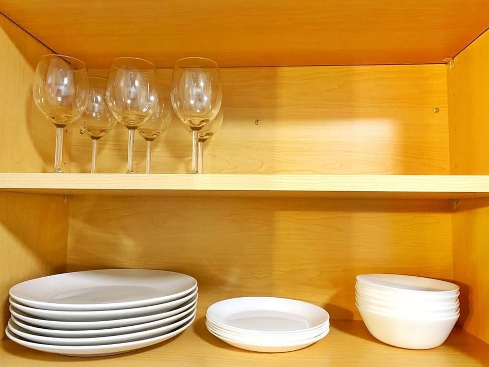 Prepare meals with ease in this fully stocked kitchen.