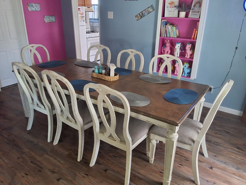 Large dining table that seats eight plenty of room to enjoy your meals.