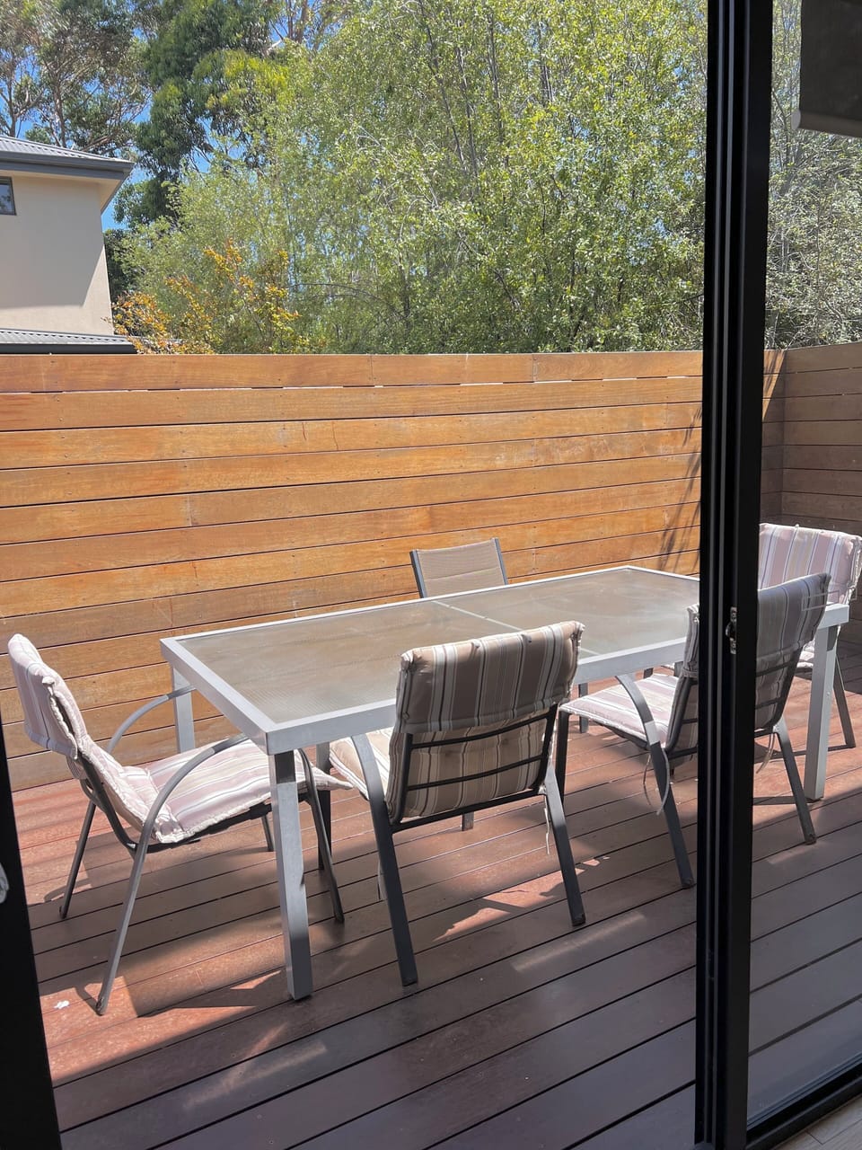 Enjoy a drink under the sun on the deck