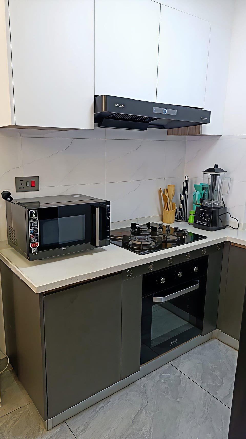 Luxury Apartment, City View | Private kitchen | Coffee/tea maker, electric kettle, dining tables
