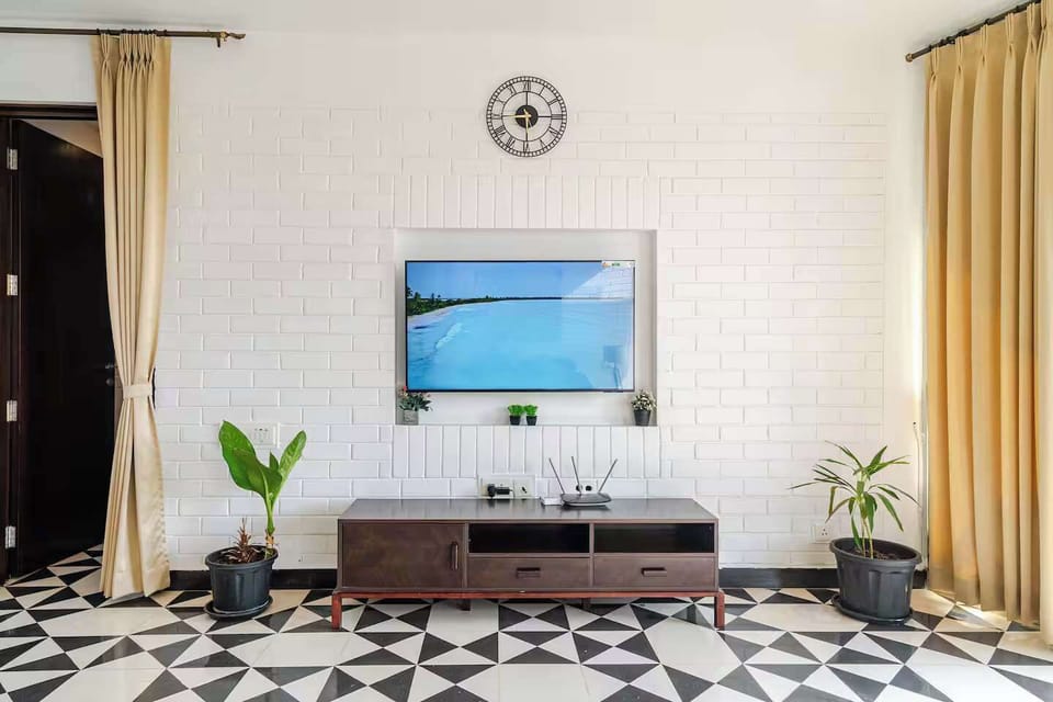 55-inch Smart TV with digital channels, books
