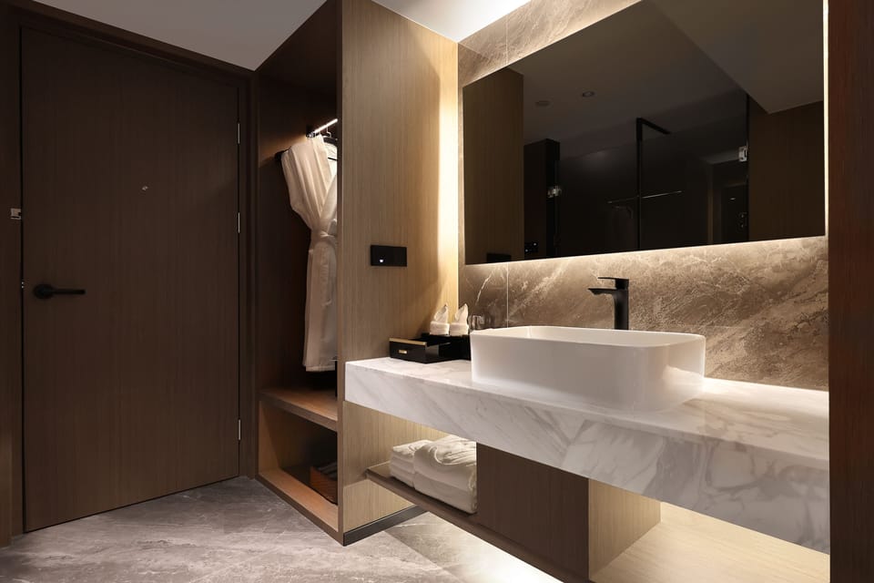 Shower, bathrobes, slippers, towels