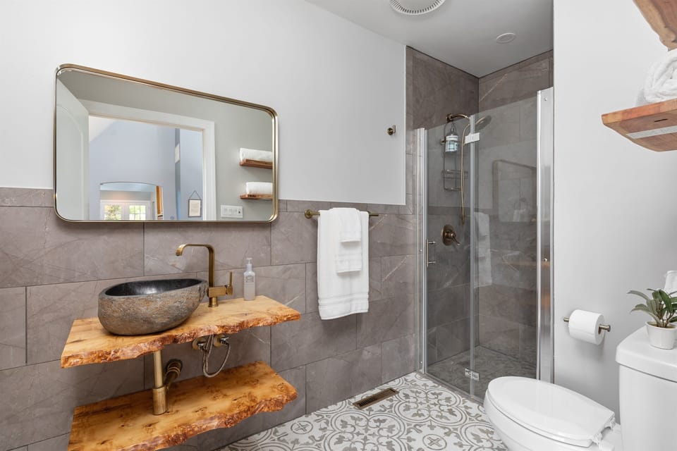 Full bathroom with walk-in stepless shower for easy access