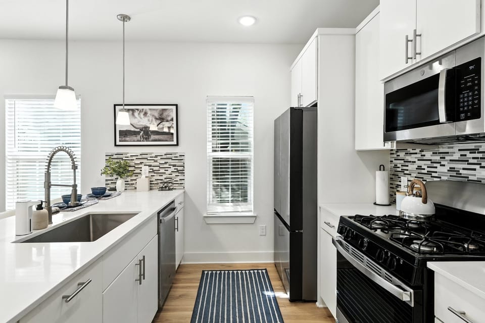 gourmet kitchen is fully stocked, has beverage center perfect for family and group cocktail