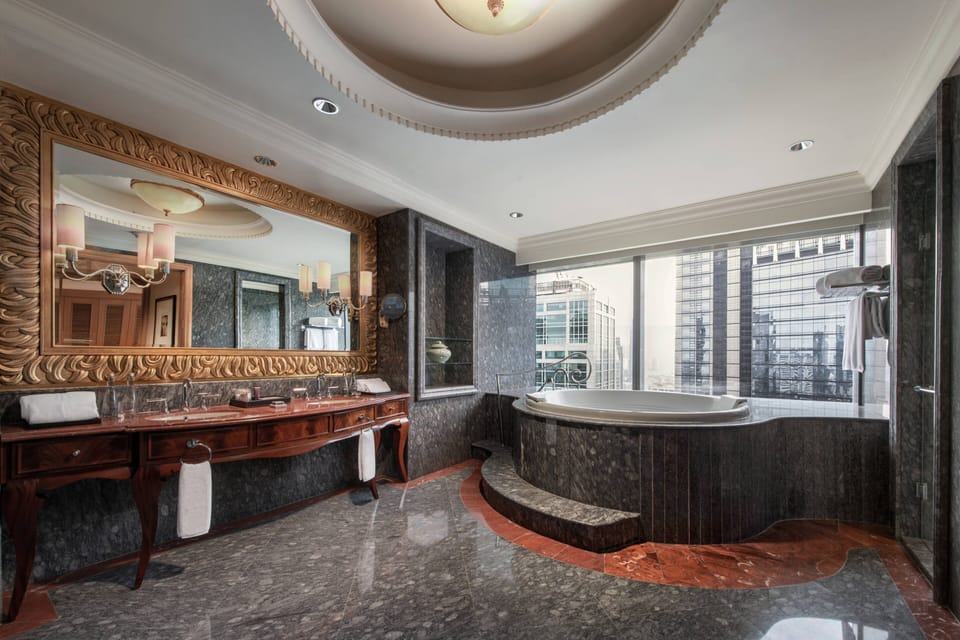 Presidential Suite, 1 King Bed, City View | Bathroom | Separate tub and shower, designer toiletries, hair dryer, bathrobes