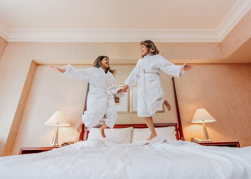 Premium bedding, down comforters, minibar, in-room safe